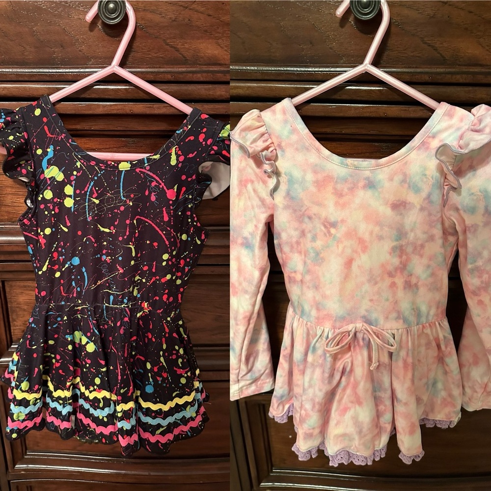 Cheeky Plum skirted leotards sizes 4T and 5T.